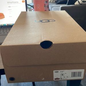 Tazz Ugg chestnut color in size 7. Brand new.